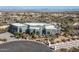 Expansive desert home exterior with mature landscaping and circular driveway at 15830 E Eagle Crest Rd, Fountain Hills, AZ 85268