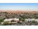 Desert landscape view featuring houses and rolling hills at 15830 E Eagle Crest Rd, Fountain Hills, AZ 85268