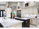 Lovely kitchen with marble countertops, custom cabinetry, stainless appliances and kitchen island at 15830 E Eagle Crest Rd, Fountain Hills, AZ 85268