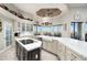 Spacious kitchen with marble countertops, oversized island, and panoramic outdoor views at 15830 E Eagle Crest Rd, Fountain Hills, AZ 85268