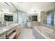 Luxurious main bathroom featuring a jacuzzi tub, double vanity, and abundant counter space at 15830 E Eagle Crest Rd, Fountain Hills, AZ 85268