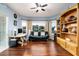 Well-lit home office with desk, sofa, and natural light at 15830 E Eagle Crest Rd, Fountain Hills, AZ 85268