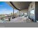 A spacious covered patio provides a shaded outdoor space to dine at 15830 E Eagle Crest Rd, Fountain Hills, AZ 85268