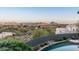Stunning pool view overlooking a vast desert landscape and mountains at 15830 E Eagle Crest Rd, Fountain Hills, AZ 85268