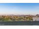 Breathtaking views of desert community and fountain framed by a sturdy fence, creating a tranquil and secure setting at 15830 E Eagle Crest Rd, Fountain Hills, AZ 85268