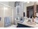 Bathroom featuring a vanity with storage, a toilet, and a shower at 17200 W Bell Rd # 1628, Surprise, AZ 85374