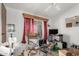 Bedroom with a large window, a TV, and an office space at 17200 W Bell Rd # 1628, Surprise, AZ 85374