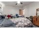 Spacious bedroom with ceiling fan and dresser with lots of storage at 17200 W Bell Rd # 1628, Surprise, AZ 85374
