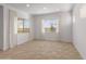 Bedroom with neutral walls and tile flooring at 17347 W Chama Dr, Surprise, AZ 85387