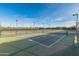 View of the community pickleball courts, complete with nets and lighting at 17347 W Chama Dr, Surprise, AZ 85387