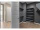 Spacious walk-in closet with ample shelving and rod space at 17347 W Chama Dr, Surprise, AZ 85387