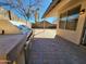 Backyard with a stone patio featuring a built-in BBQ area at 1771 E Erie St, Gilbert, AZ 85295