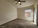 Bright bedroom with a ceiling fan and a window providing natural light at 1771 E Erie St, Gilbert, AZ 85295