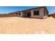 The backyard with potential for landscaping, offering space for outdoor activities and relaxation at 20570 S 216Th Pl, Queen Creek, AZ 85142