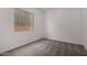 Bright bedroom with carpeted floors and a window providing natural light at 20570 S 216Th Pl, Queen Creek, AZ 85142