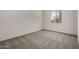 Bedroom with carpet and a window that provides plenty of natural light at 20570 S 216Th Pl, Queen Creek, AZ 85142