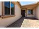 Exterior facade of a home featuring a doorway and side windows at 20570 S 216Th Pl, Queen Creek, AZ 85142