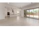 Bright, airy kitchen with an island, stainless steel appliances and large sliding glass doors at 20570 S 216Th Pl, Queen Creek, AZ 85142