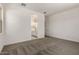 Main bedroom features carpeted floors with ensuite bath with double sinks at 20570 S 216Th Pl, Queen Creek, AZ 85142
