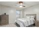 Cozy bedroom featuring a ceiling fan, neutral colors, and a coordinated furniture set at 25589 W Pleasant Ln, Buckeye, AZ 85326