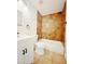 Bathroom featuring a modern vanity with tub and tile surround at 2737 W Alice Ave, Phoenix, AZ 85051