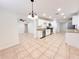 Bright, open kitchen with granite countertops and stainless steel appliances at 2737 W Alice Ave, Phoenix, AZ 85051