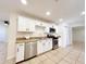 Stylish kitchen featuring stainless steel appliances and bright white cabinets at 2737 W Alice Ave, Phoenix, AZ 85051