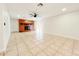 Spacious living room with brick fireplace and sliding glass doors for natural light at 2737 W Alice Ave, Phoenix, AZ 85051