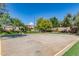 Enjoy a game of basketball on this well-maintained community court, surrounded by mature trees and landscaping at 2744 E Donato Dr, Gilbert, AZ 85298