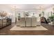 Bright dining room featuring contemporary lighting, neutral color palette and stylish decor at 2744 E Donato Dr, Gilbert, AZ 85298