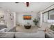 Comfortable living room features a modern decor with a large sectional sofa at 2744 E Donato Dr, Gilbert, AZ 85298