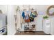 Inviting mudroom with built-in shelving, coat hooks, and organized shoe storage at 2744 E Donato Dr, Gilbert, AZ 85298
