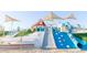 Community playground featuring slides, climbing area, and shade structures for a fun outdoor experience at 2744 E Donato Dr, Gilbert, AZ 85298