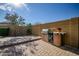 Backyard featuring a built-in BBQ and lush green landscaping with an outdoor grill at 2829 W Haley Dr, Anthem, AZ 85086