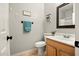 Cozy bathroom featuring tile floors, vanity, toilet, and neutral wall color at 2829 W Haley Dr, Anthem, AZ 85086