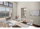Bright dining area with white furnishings, a large table, and a visible whiteboard at 2829 W Haley Dr, Anthem, AZ 85086