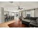Open-concept living room, seamlessly connects to the kitchen and dining area, creating an inviting and spacious atmosphere at 2829 W Haley Dr, Anthem, AZ 85086