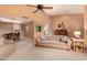 Comfortable living room with ceiling fan, views to kitchen and dining room, and natural light at 3226 E Lazy Ln, Phoenix, AZ 85028