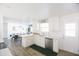 Bright, open kitchen featuring stainless steel appliances and sleek white cabinets and modern finishes at 3326 N 82Nd Pl, Scottsdale, AZ 85251