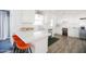 Bright kitchen with white cabinets, quartz countertops, stainless steel appliances and eat-in breakfast bar at 3326 N 82Nd Pl, Scottsdale, AZ 85251