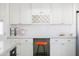 Modern kitchen has white cabinets, modern appliances, stylish subway tile, and a functional workspace at 3326 N 82Nd Pl, Scottsdale, AZ 85251