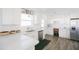 Contemporary kitchen with white subway tile backsplash, stainless steel appliances and plentiful counterspace at 3326 N 82Nd Pl, Scottsdale, AZ 85251