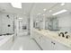 Elegant bathroom features double sinks, a soaking tub, and a glass-enclosed shower at 3500 E Lincoln Dr # 6, Phoenix, AZ 85018