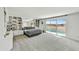 Spacious main bedroom with built-in bookshelves and a sliding glass door to the pool at 3500 E Lincoln Dr # 6, Phoenix, AZ 85018