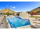 Stunning pool with mountain views and modern architectural home design, perfect for outdoor relaxation and entertaining at 3500 E Lincoln Dr # 6, Phoenix, AZ 85018