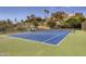 Well-maintained outdoor tennis court with lush landscaping at 3500 E Lincoln Dr # 6, Phoenix, AZ 85018