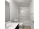 Clean bathroom featuring a shower-tub combo and modern fixtures at 40995 W Portis Dr, Maricopa, AZ 85138