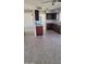 Open kitchen with granite counters, dark wood cabinets and stainless steel appliances at 4124 E Apollo Rd, Phoenix, AZ 85042