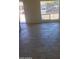 Open living space with a large window and lots of natural light at 4124 E Apollo Rd, Phoenix, AZ 85042