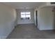 Empty room with tiled floors and window at 4124 E Apollo Rd, Phoenix, AZ 85042